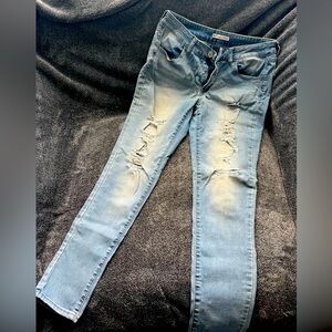 Distressed jegging with long inseam